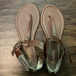 Brown and gold sandals